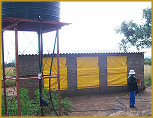 Completed chicken coop and water tank